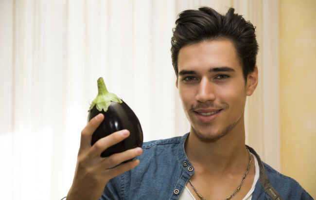 Man holding eggplant. Too big?