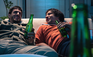 Two men on sofa