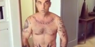 Robbie Williams naked with cake