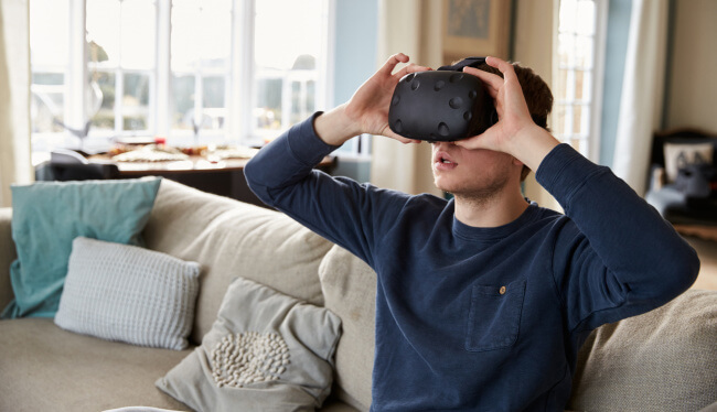 Man with virtual reality headset watching gay porn