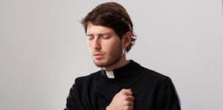 Young sad priest pastor