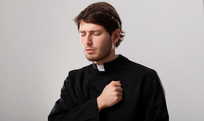Young sad priest pastor