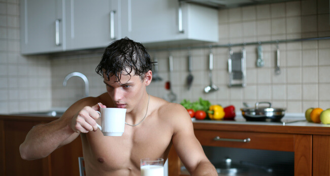 Man drinking tasting breakfast