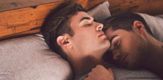 Gay couple in bed