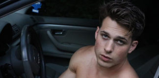 Nick Sandell changing in car