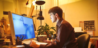 Man in front of computer